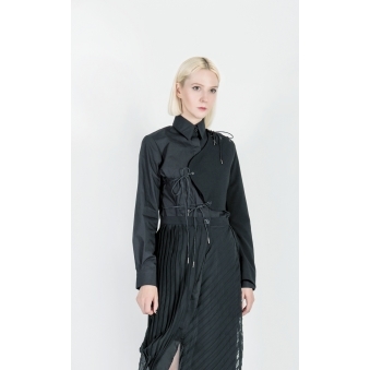 Comes in Black: Single Sleeve Vest